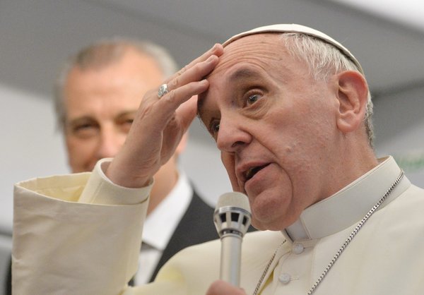 Pope Francis spoke with reporters during a press conference on the flight back to Italy after his departure from Rio de Janeiro.