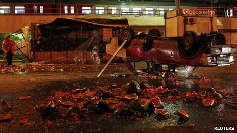 The protesters attacked a vegetable market where migrants work, leaving produce smashed in their wake