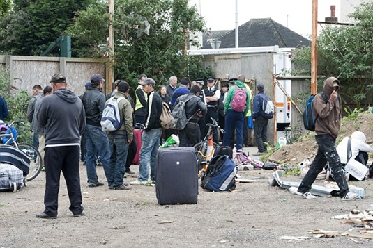 Romanians in Hendon being rounded up by the Police earlier this year Romanians in Hendon being rounded up by the Police earlier this year