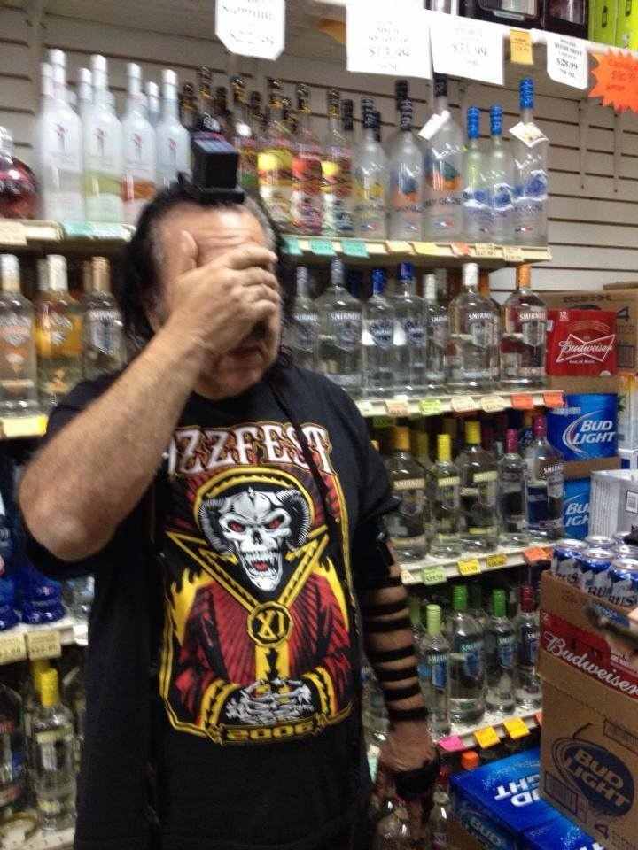Porno Jew Ron Jeremy engages in a Jew ritual inside a liquor store.
