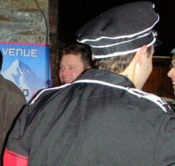Aidan Burley is seen over the shoulder of Mark Fournier in a Nazi style SS uniform at a venue in Val Thorens in the French Alps in 2011 Aidan Burley is seen over the shoulder of Mark Fournier in a Nazi style SS uniform at a venue in Val Thorens in the French Alps in 2011