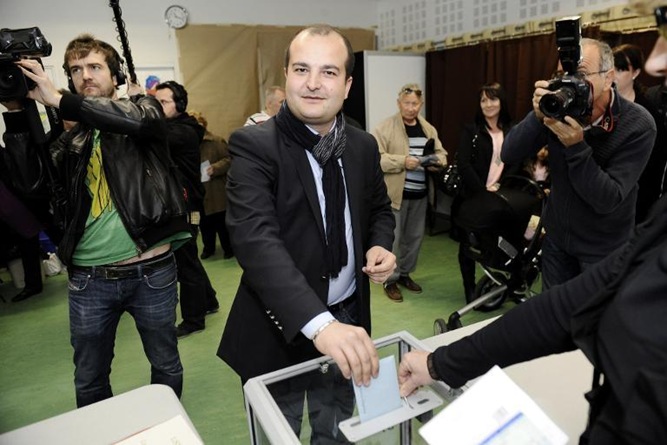 Front National candidate David Rachline smiles as he cast his ballot during the municipal elections in Frejus, on March 23, 2014 Front National candidate David Rachline smiles as he cast his ballot during the municipal elections in Frejus, on March 23, 2014