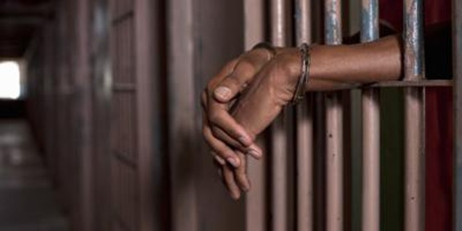 o-BLACK-MAN-HANDCUFFS-facebook o-BLACK-MAN-HANDCUFFS-facebook