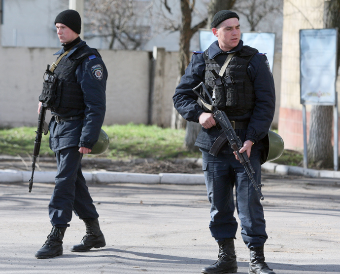 Boys in blue: Ukrainian forces keep defecting to the protesters' side, mostly because they hate freedom but also because they have no idea what they are fighting for.