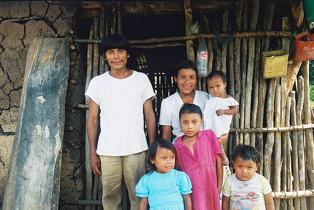 This family of Mayan Indians believes they are going for a nice hot shower. In reality, the building behind them is a gas chamber, where they will be genocided with bug spray.