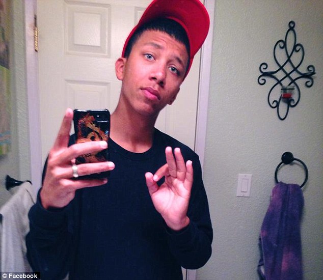 The gayboy Raymond, before his face was destroyed