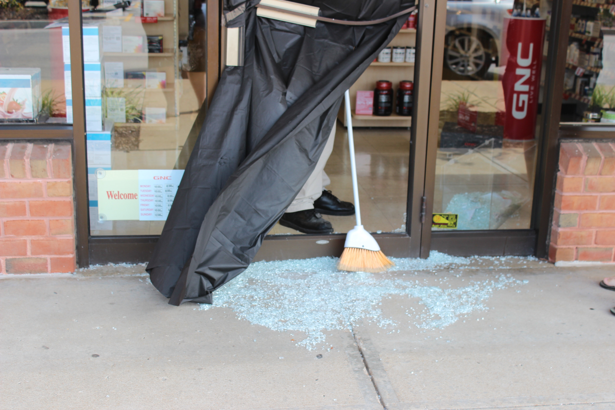This GNC really shows how angry some people were, as the steel door handle was twisted and mangled