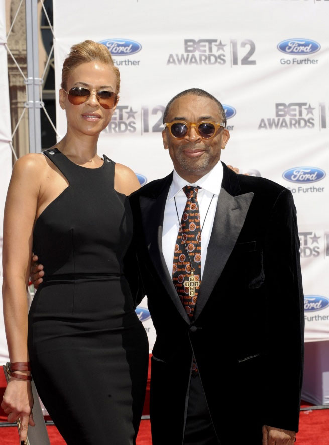 Your wife is looking a bit pastey, Spike. What's up with that? It's almost as if fair-skinned women with European facial features are more attractive than out-of-the-jungle Negroes. Not very Afro-Centric of you, Spike.