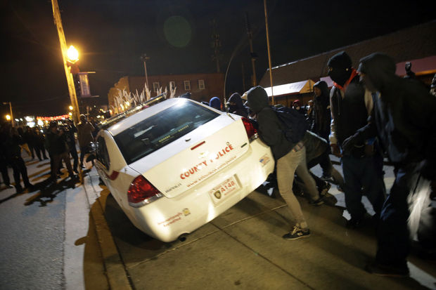 Flipping a cop car for justice