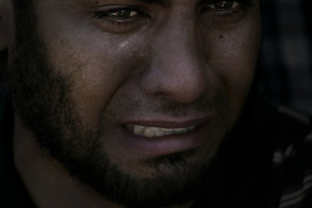Hashim is crying into his Quran 