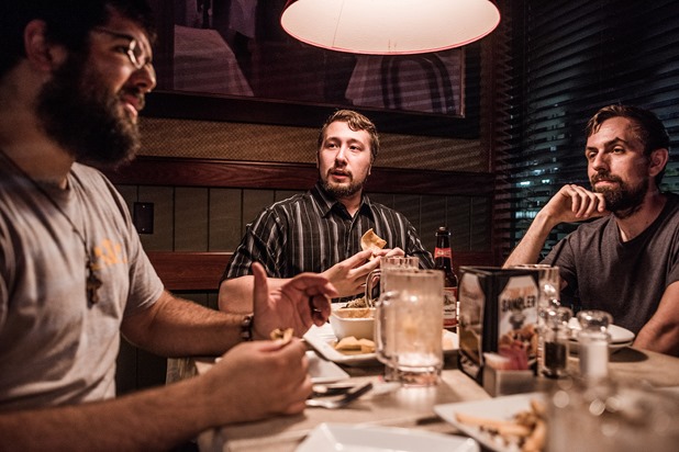 From left, Mathew Heimbach, Scott Hess and Tony Hovater eat dinner at Ruby Tuesdays after a confederate flag rally held in a parking lot in Seymour, Tennessee on Thursday, July 17, 2015. Host Tom Pierce, and guest, Mathew Heimbach delivered speeches before prompting the group to drive with flags raised through Knoxville. Mike Belleme for Al Jazeera America From left, Mathew Heimbach, Scott Hess and Tony Hovater eat dinner at Ruby Tuesdays after a confederate flag rally held in a parking lot in Seymour, Tennessee on Thursday, July 17, 2015. Host Tom Pierce, and guest, Mathew Heimbach delivered speeches before prompting the group to drive with flags raised through Knoxville. Mike Belleme for Al Jazeera America