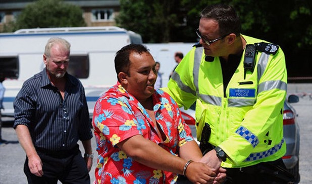 Cuffs-on-Police-escort-a-traveller-from-an-illegal-camp-in-Swansea-312531 Cuffs-on-Police-escort-a-traveller-from-an-illegal-camp-in-Swansea-312531