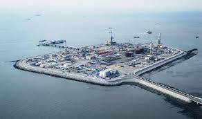This peaceful installation on the scenic South China sea has nothing to do with world domination, round eye. Erm, it's a shrimp farm