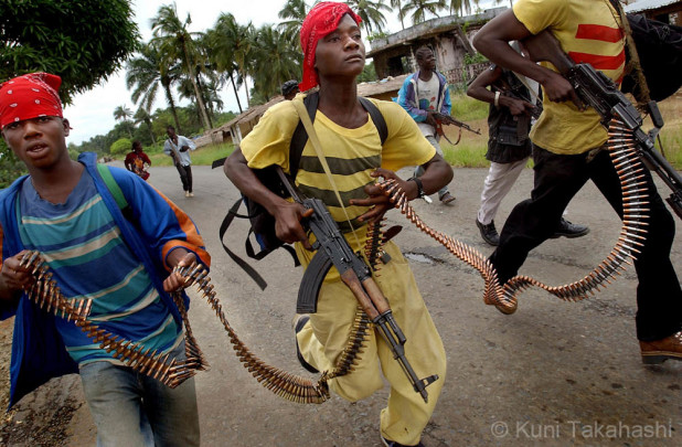 Story of civil war in Liberia. The civil war between the government and rebels has been going on-and-off for last 14 years and over 25,000 people were killed. Government militia rush to the scene of shooting incident in Brewreville, northwesten suburb of Monrovia, as rebel forces keep their attack on the capital strong.