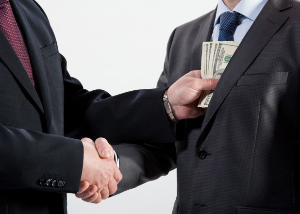 Corruption-bribe-5-x-7.-123rf