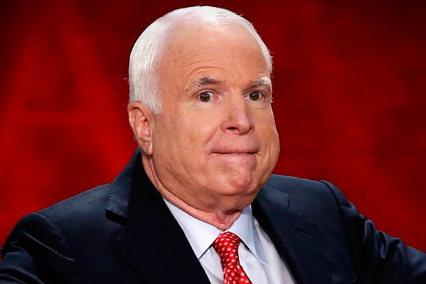 U.S. Senator John McCain (R-AZ) gestures as he arrives to address the third session of the Republican National Convention in Tampa, Florida, August 29, 2012. REUTERS/Mike Segar (UNITED STATES - Tags: POLITICS ELECTIONS) - RTR3797G
