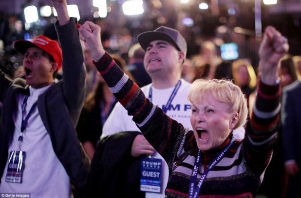 3a31b7eb00000578-3918838-pro_trump_fist_pump_supporters_of_the_republican_candidate_in_ne-a-6_1478667625356