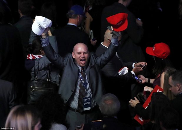 3a31d22800000578-3918838-hats_off_trump_supporters_wave_their_hats_in_joy_as_the_returns_-a-12_1478667625518